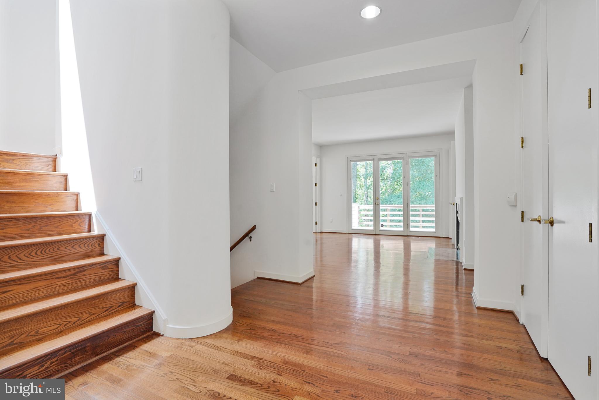 926 Saigon Road McLean, VA 22102 - Photo 12 of 54 Gracious Foyer w/ Half-Landing Stairs