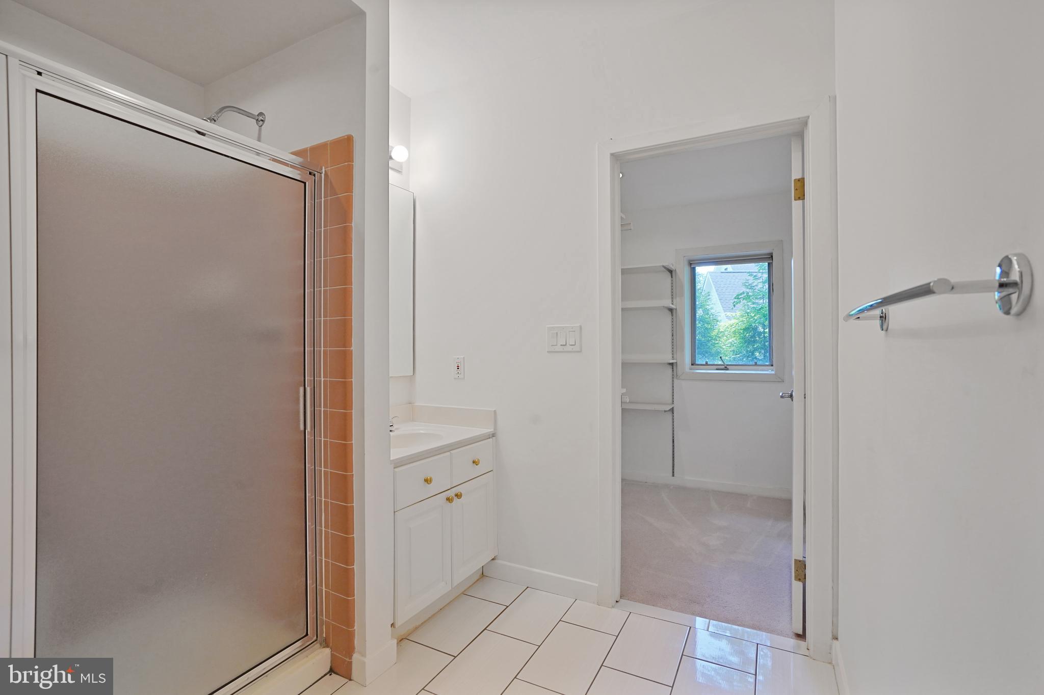 926 Saigon Road McLean, VA 22102 - Photo 42 of 54 Vanity Two, Shower, and second Walk-in Closet