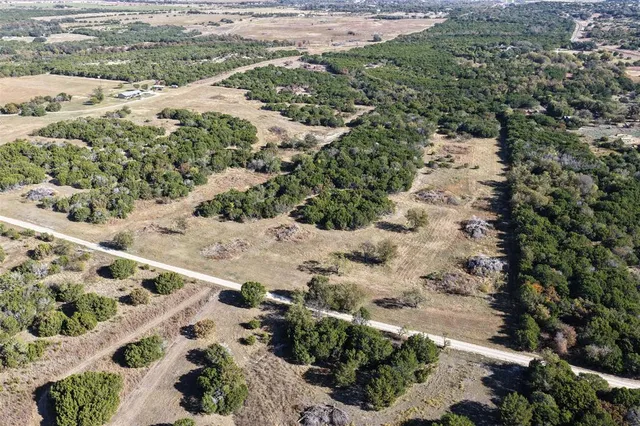 a view of a water heater and a stove