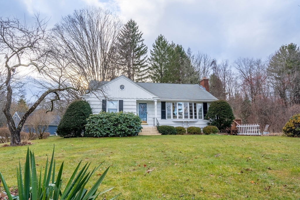 838 Pleasant Street Rochdale, MA 01542 - Photo 1 of 30 a front view of a house with a yard