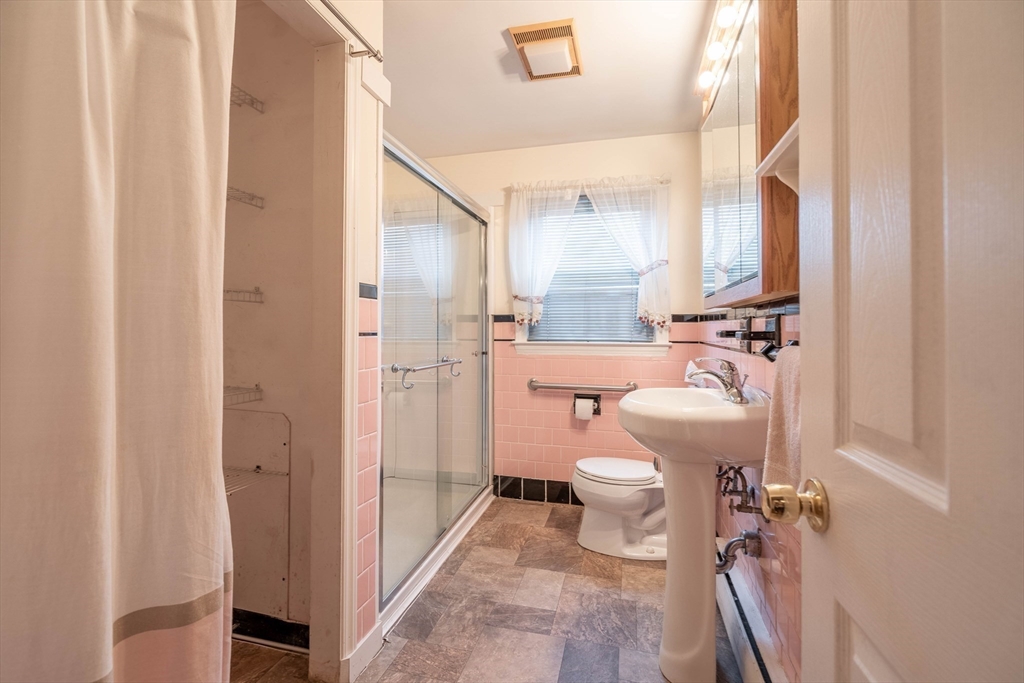 838 Pleasant Street Rochdale, MA 01542 - Photo 19 of 30 a bathroom with a sink toilet and shower