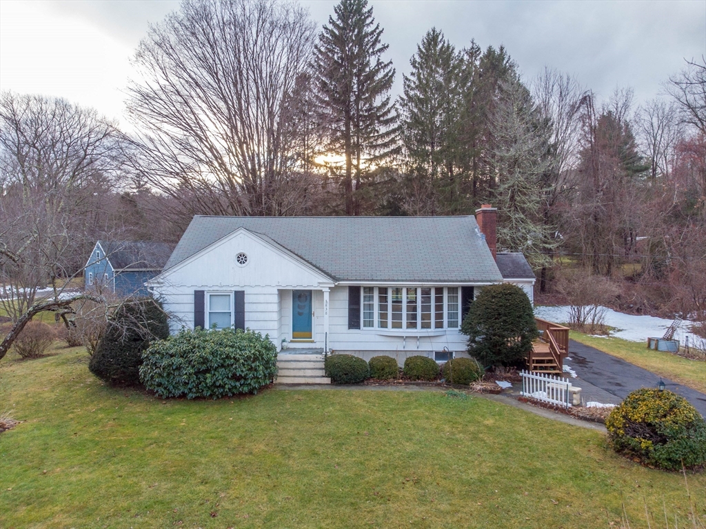 838 Pleasant Street Rochdale, MA 01542 - Photo 2 of 30 a view of a house with a yard and fence