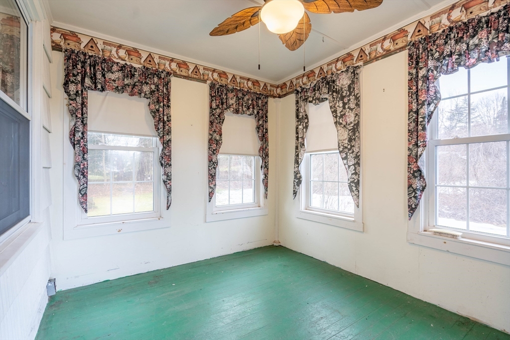 838 Pleasant Street Rochdale, MA 01542 - Photo 24 of 30 a view of an empty room with a window
