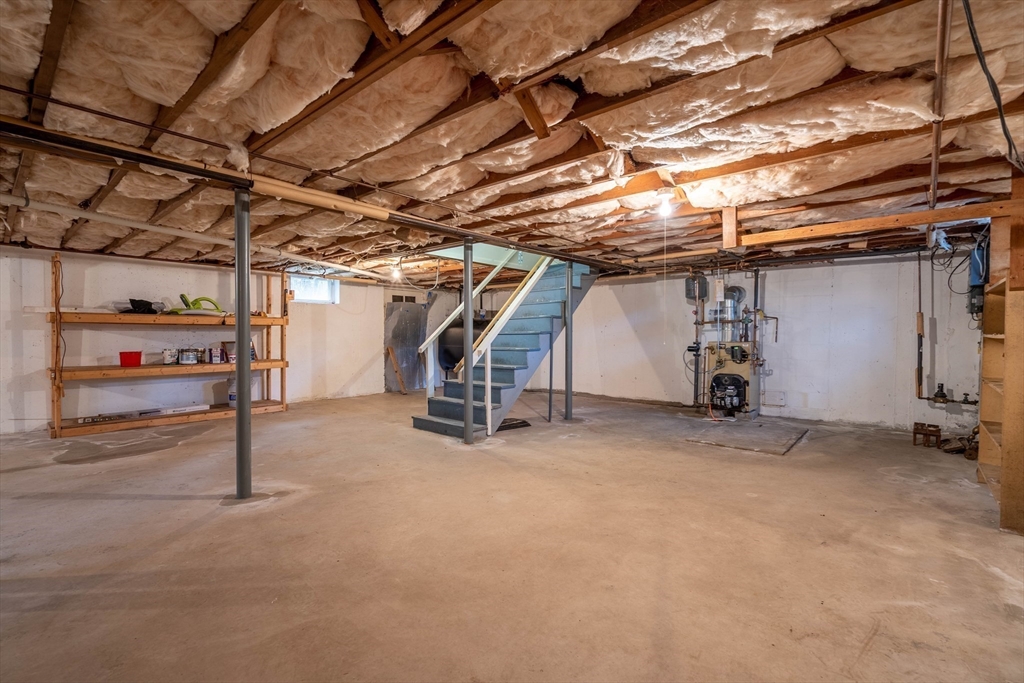 838 Pleasant Street Rochdale, MA 01542 - Photo 26 of 30 a view of empty room with wooden ceiling
