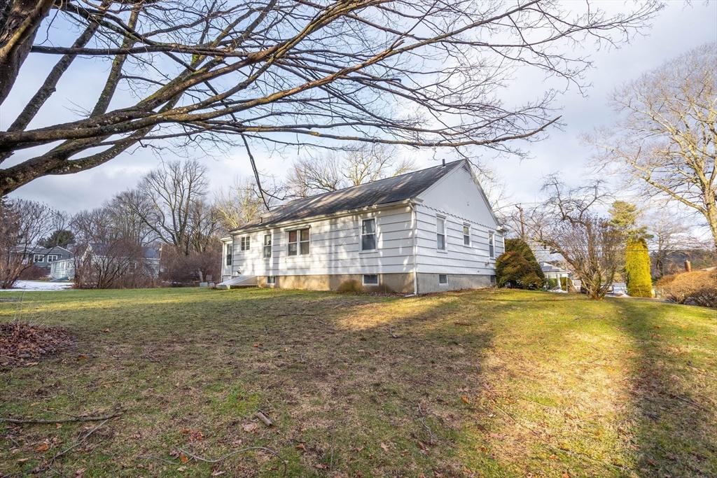 838 Pleasant Street Rochdale, MA 01542 - Photo 28 of 30 a front view of a house with a yard
