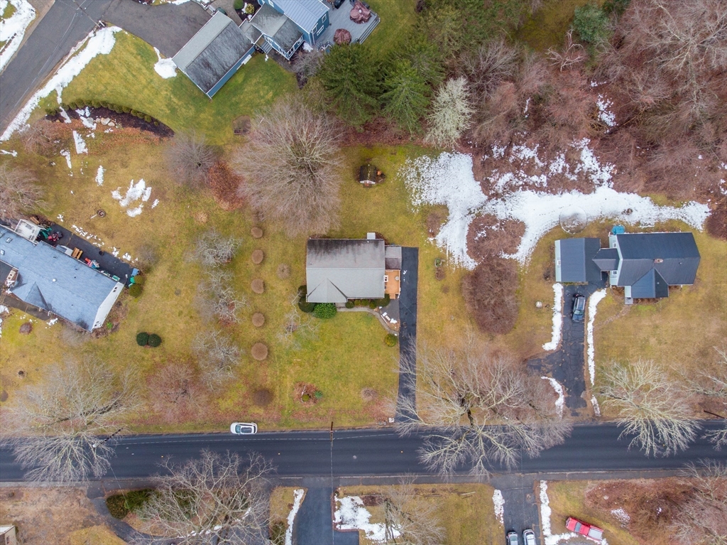 838 Pleasant Street Rochdale, MA 01542 - Photo 8 of 30 an aerial view of residential houses with outdoor space