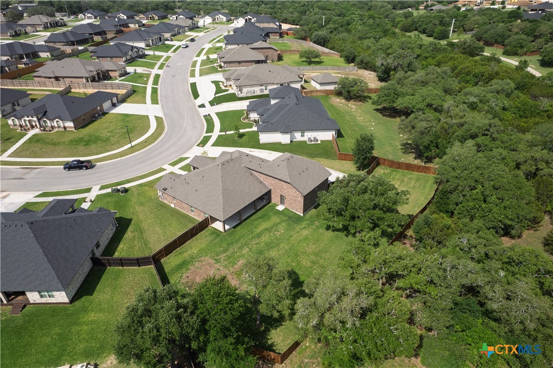 7623 Palladium Loop Killeen, TX 76542 - Photo 45 of 48 an aerial view of a house with outdoor space pool seating area and yard
