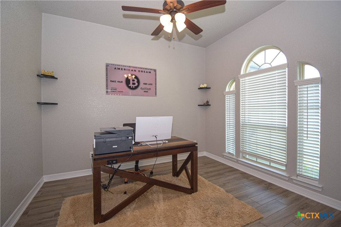 7623 Palladium Loop Killeen, TX 76542 - Photo 7 of 48 a view of a workspace with furniture and a window