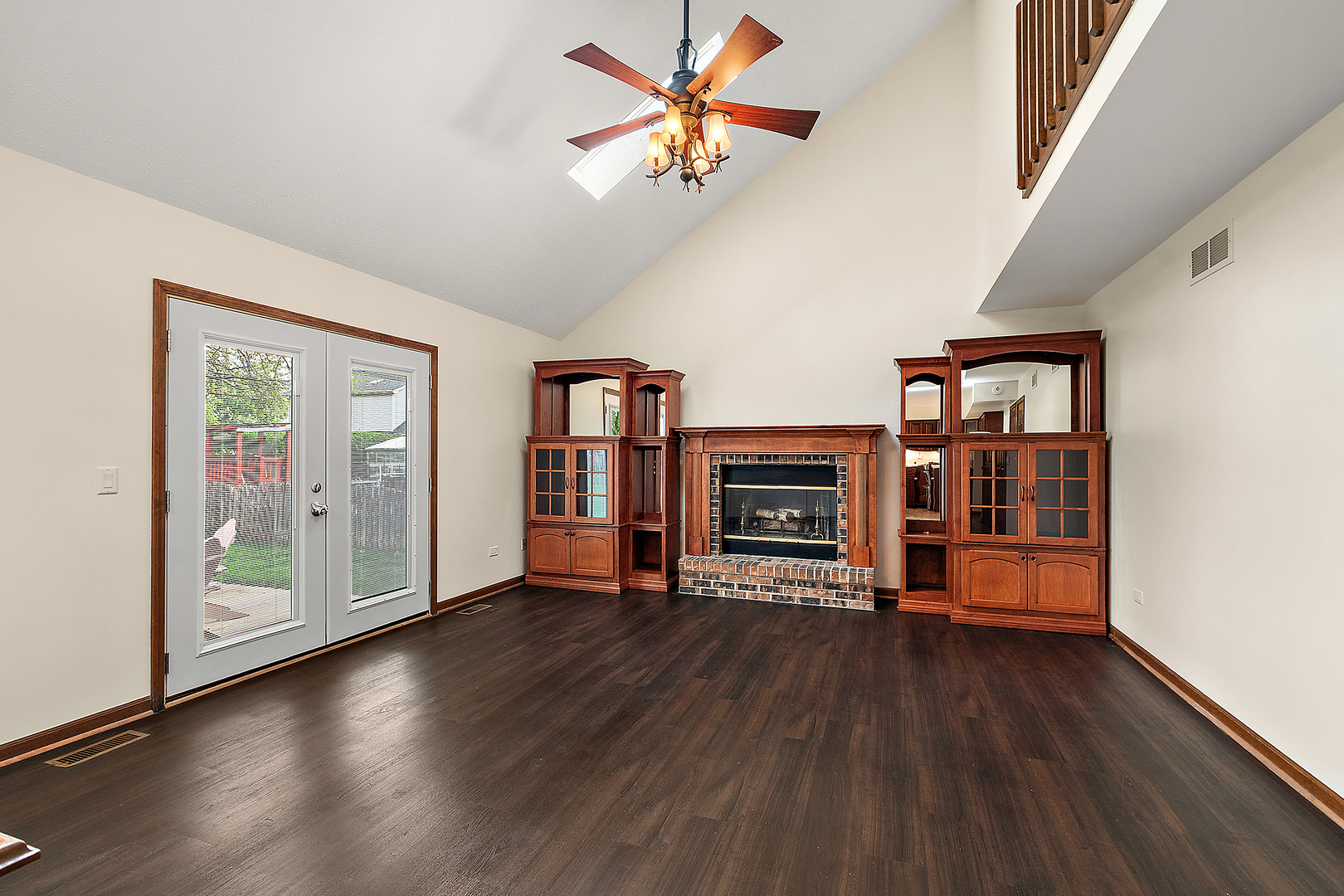 1408 Fawn Court Bolingbrook, IL 60490 - Photo 13 of 35 an empty room with floor to ceiling window