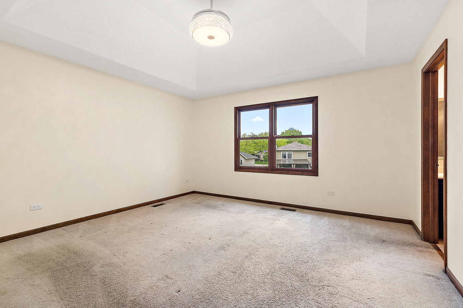 1408 Fawn Court Bolingbrook, IL 60490 - Photo 18 of 35 an empty room with windows