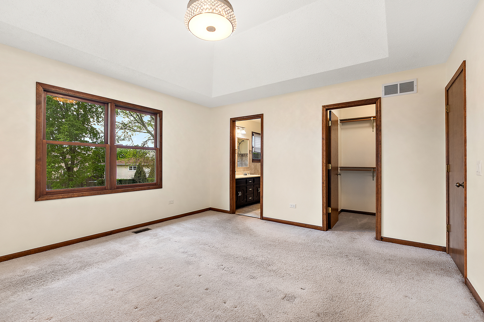 1408 Fawn Court Bolingbrook, IL 60490 - Photo 20 of 35 an empty room with windows and closet