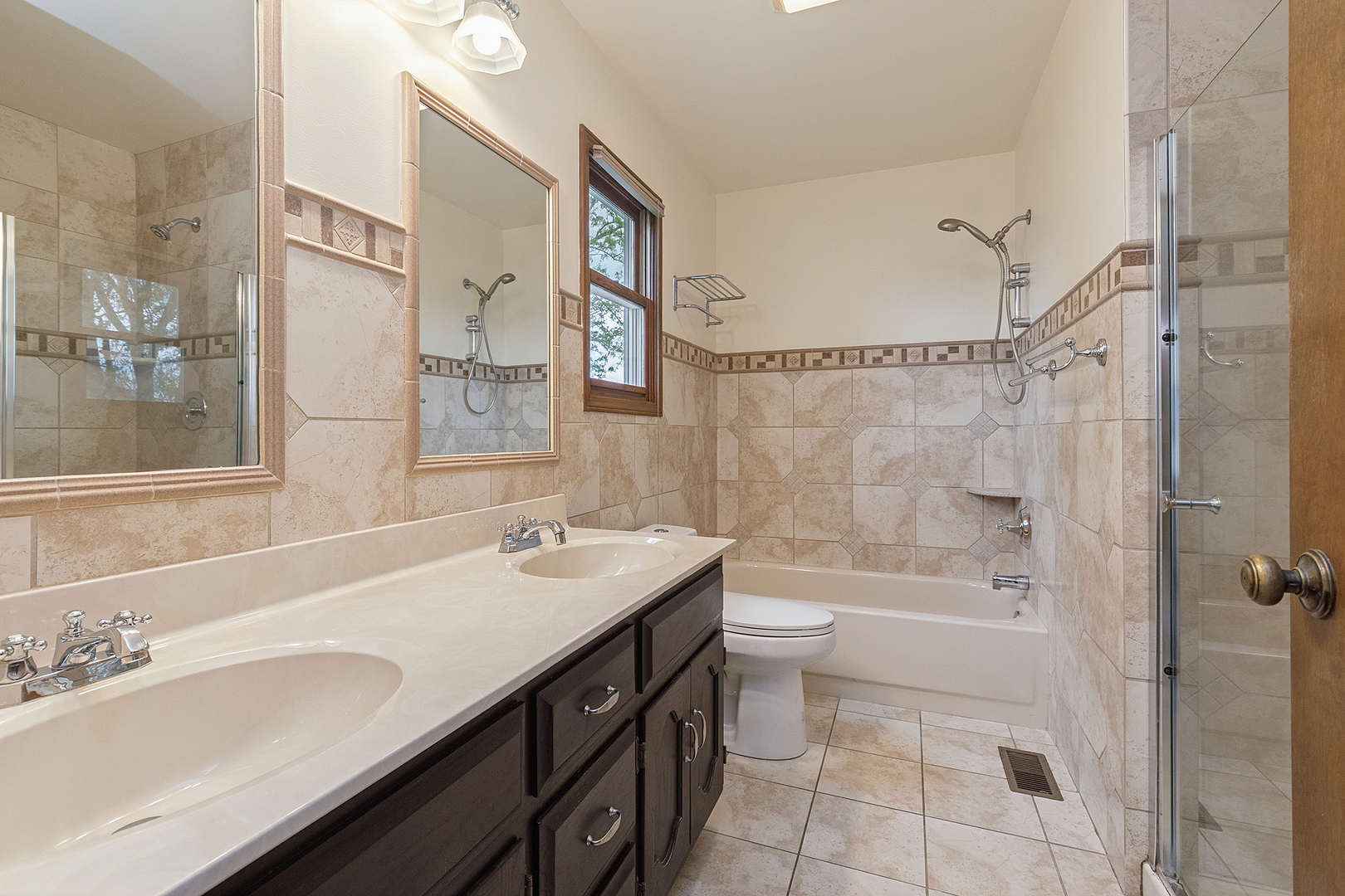 1408 Fawn Court Bolingbrook, IL 60490 - Photo 21 of 35 a bathroom with a sink a toilet and shower