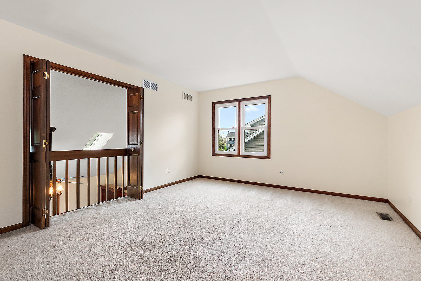 1408 Fawn Court Bolingbrook, IL 60490 - Photo 24 of 35 an empty room with windows