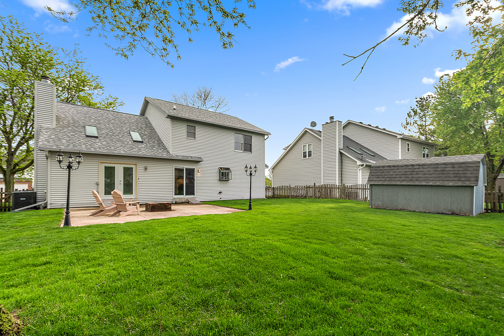 1408 Fawn Court Bolingbrook, IL 60490 - Photo 31 of 35 a view of a house with a yard and sitting area