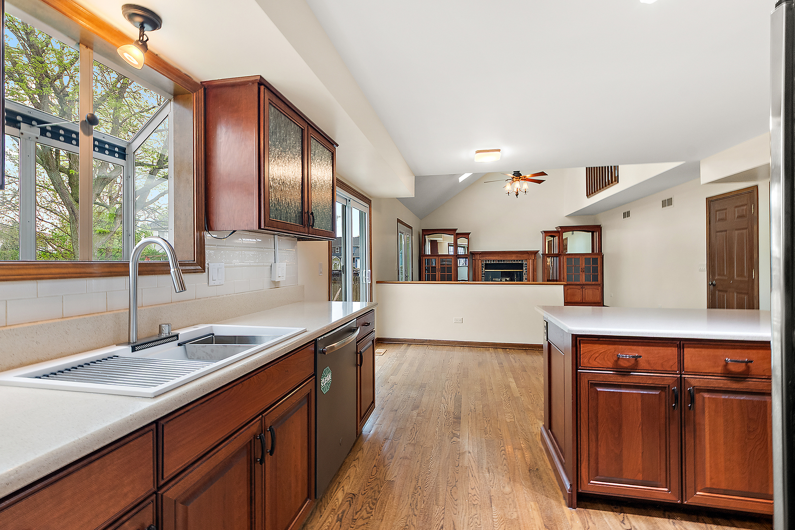 1408 Fawn Court Bolingbrook, IL 60490 - Photo 9 of 35 a kitchen with a sink cabinets and wooden floor