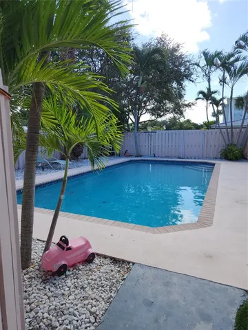 a view of a backyard with a deck