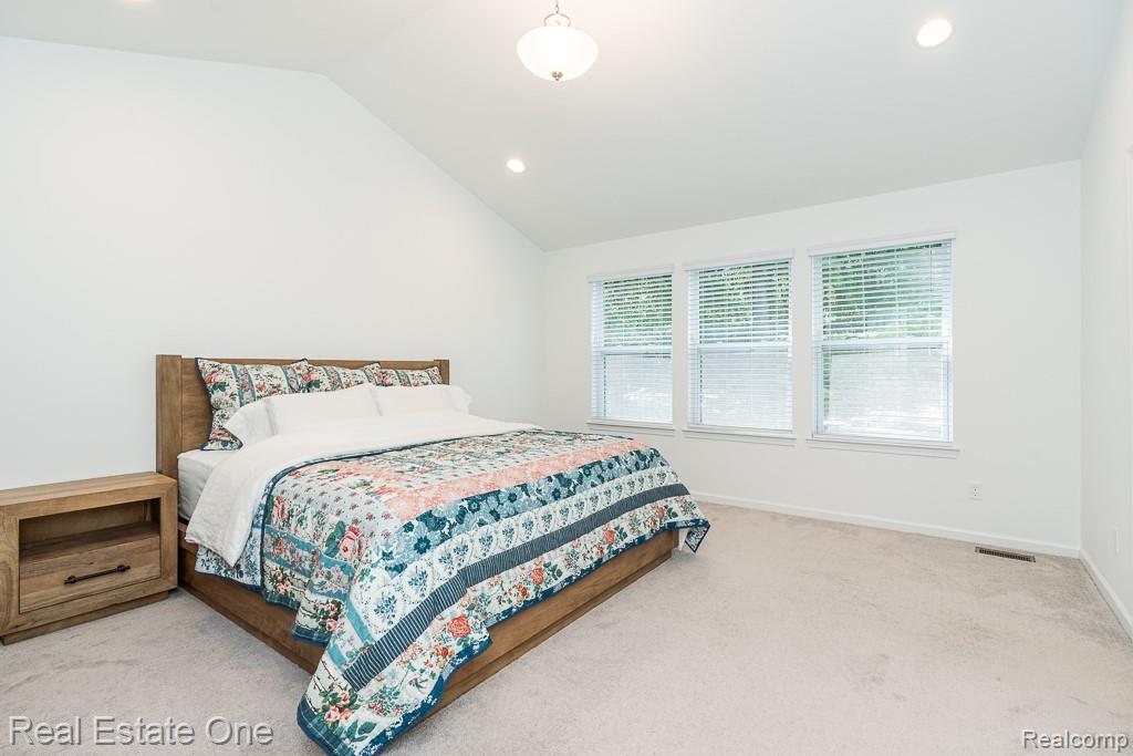 201 Beechview Drive Rochester, MI 48306 - Photo 28 of 49 Vaulted ceiling with recessed lighting and a central flush-mount fixture
