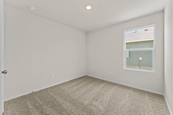 an empty room with a window