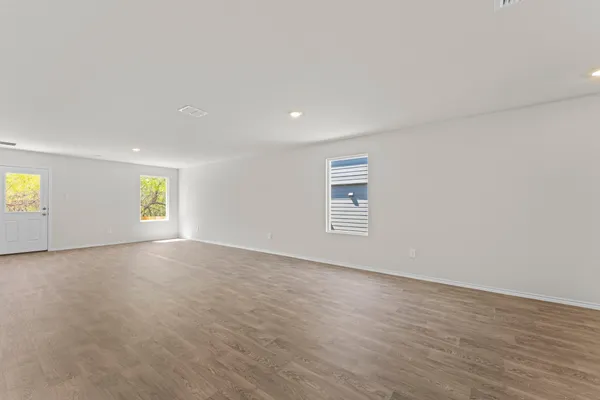 an empty room with windows