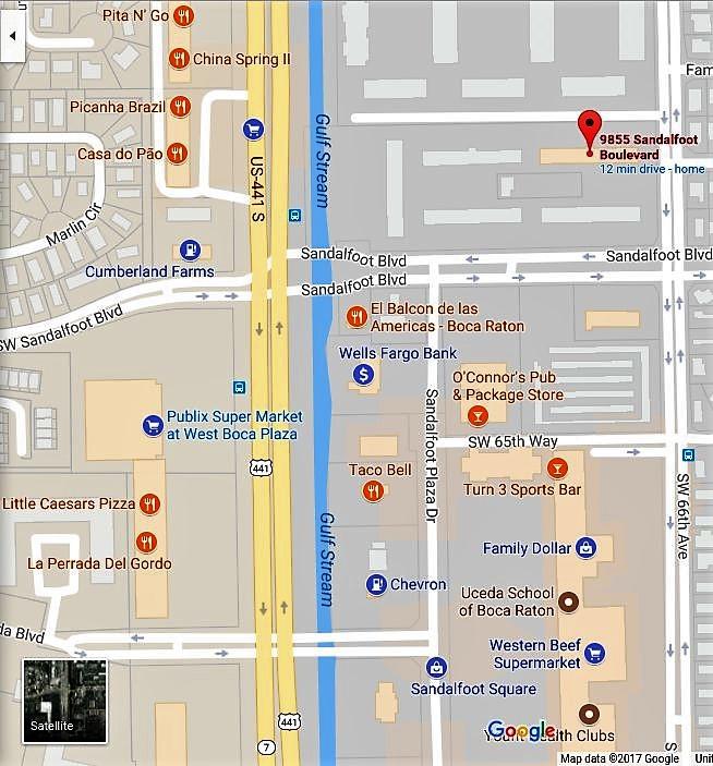 9855 Sandalfoot Boulevard, Unit 306 Boca Raton, FL 33428 - Photo 21 of 25 a white refrigerator freezer sitting inside of a kitchen