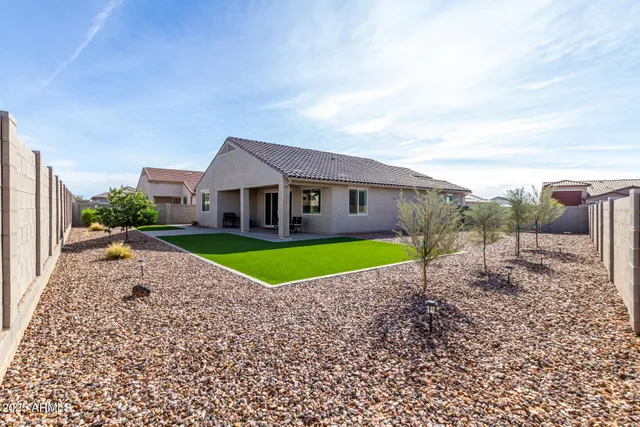 a house view with a garden space