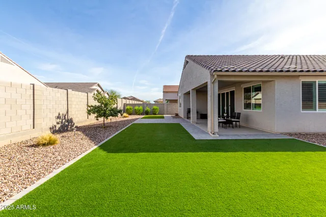 a view of a house with a patio
