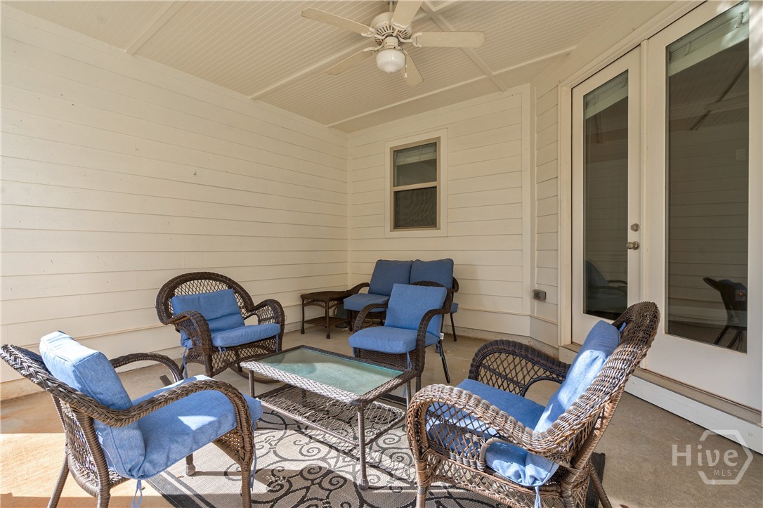 155 Red Bluff Drive Athens, GA 30607 - Photo 11 of 46 Covered porch with dining and kitchen
