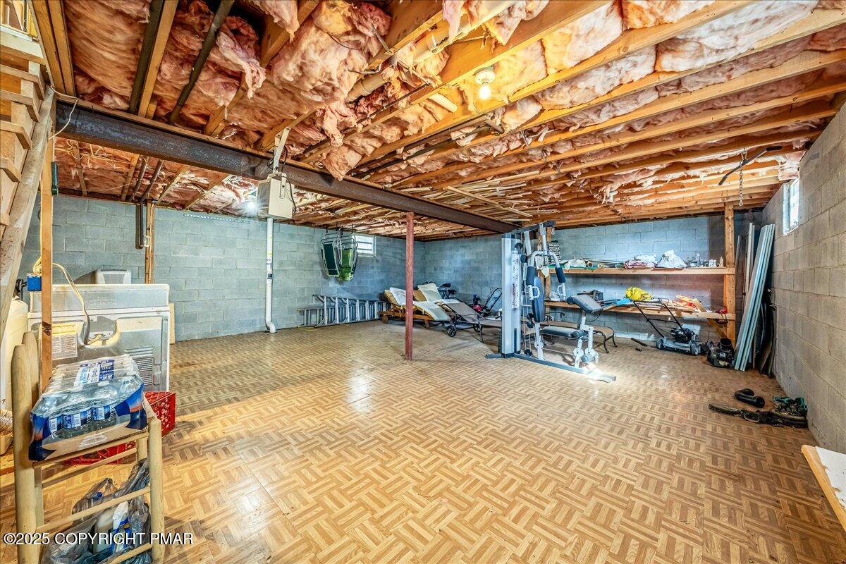 584 Pheasant Road Saylorsburg, PA 18353 - Photo 15 of 21 a view of a room with gym equipment