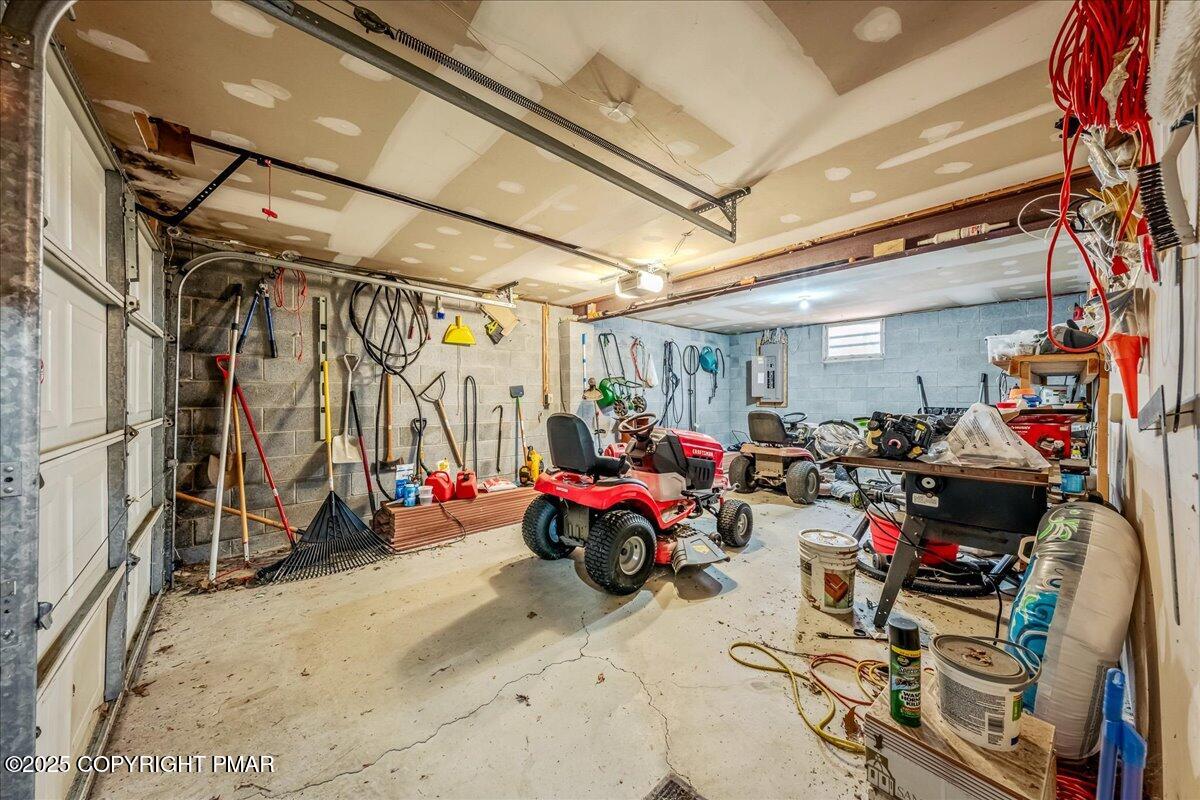584 Pheasant Road Saylorsburg, PA 18353 - Photo 16 of 21 a view of a garage with storage