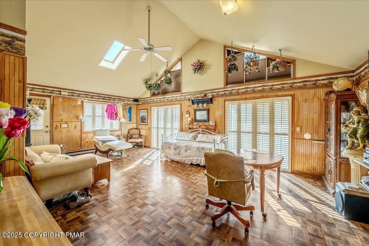 584 Pheasant Road Saylorsburg, PA 18353 - Photo 4 of 21 a living room with furniture and a chandelier