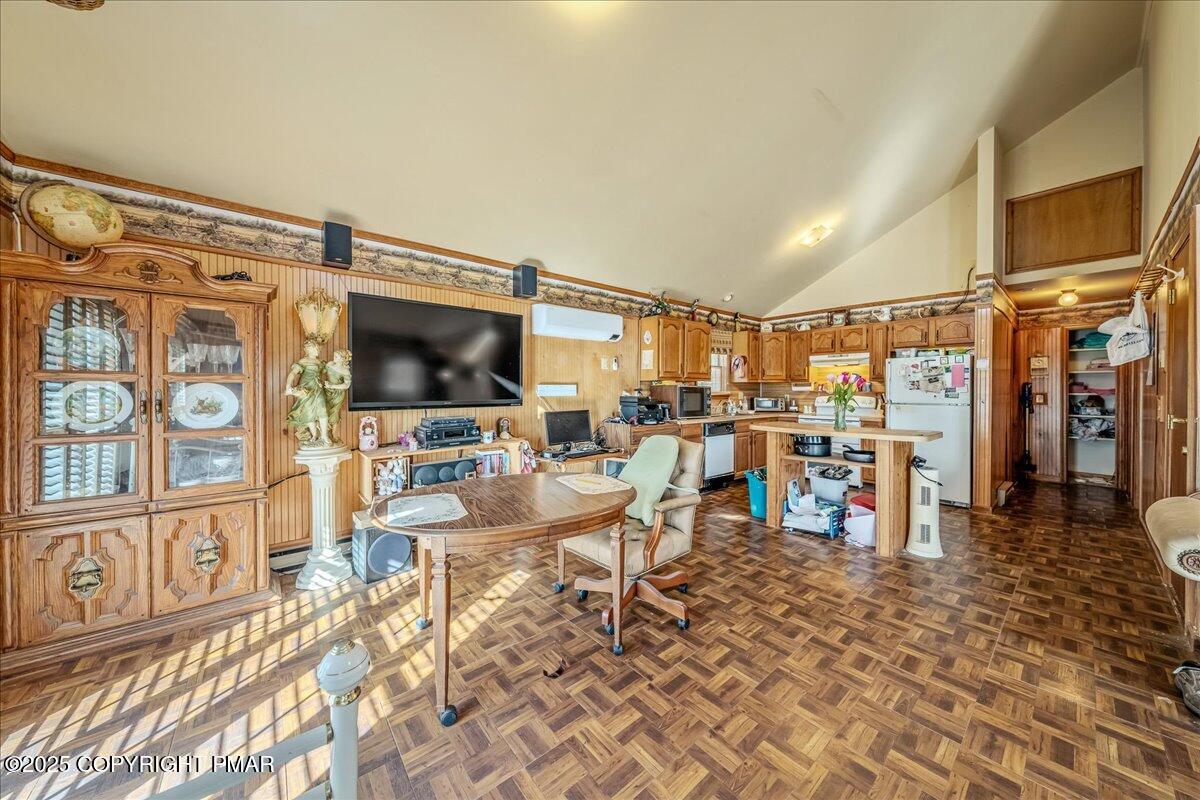 584 Pheasant Road Saylorsburg, PA 18353 - Photo 5 of 21 a living room with lots of furniture and a flat screen tv