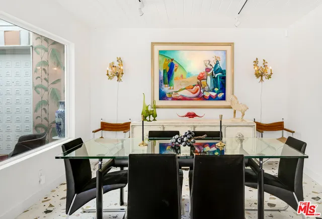 a view of a workspace with furniture