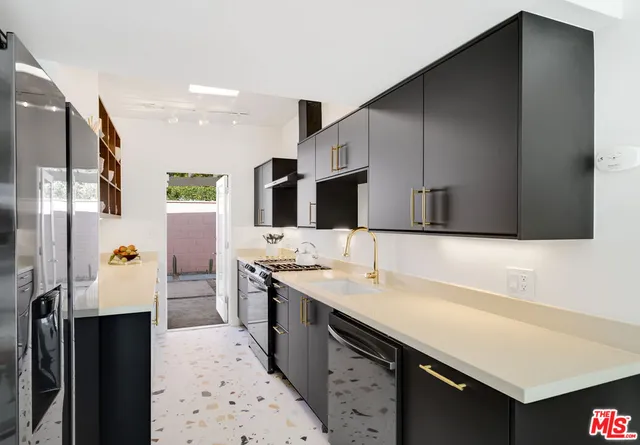 a bathroom with a sink double vanity and a mirror
