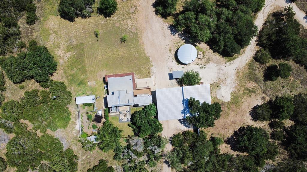 232 Spring Road Fredericksburg, TX 78624 - Photo 54 of 58 an aerial view of a residential houses with outdoor space