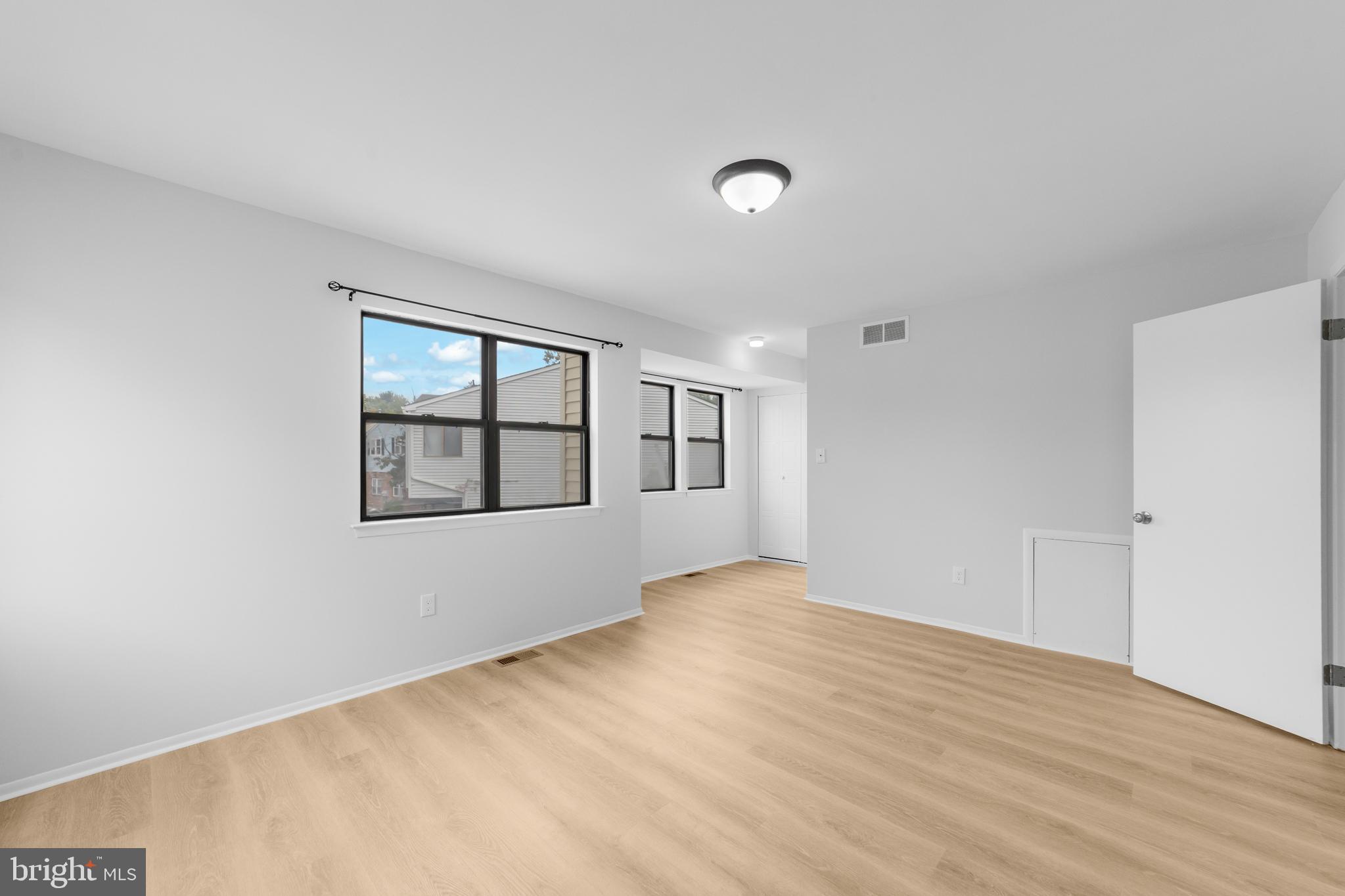 31 Phoenix Court Sewell, NJ 08080 - Photo 21 of 24 wooden floor in an empty room with a window