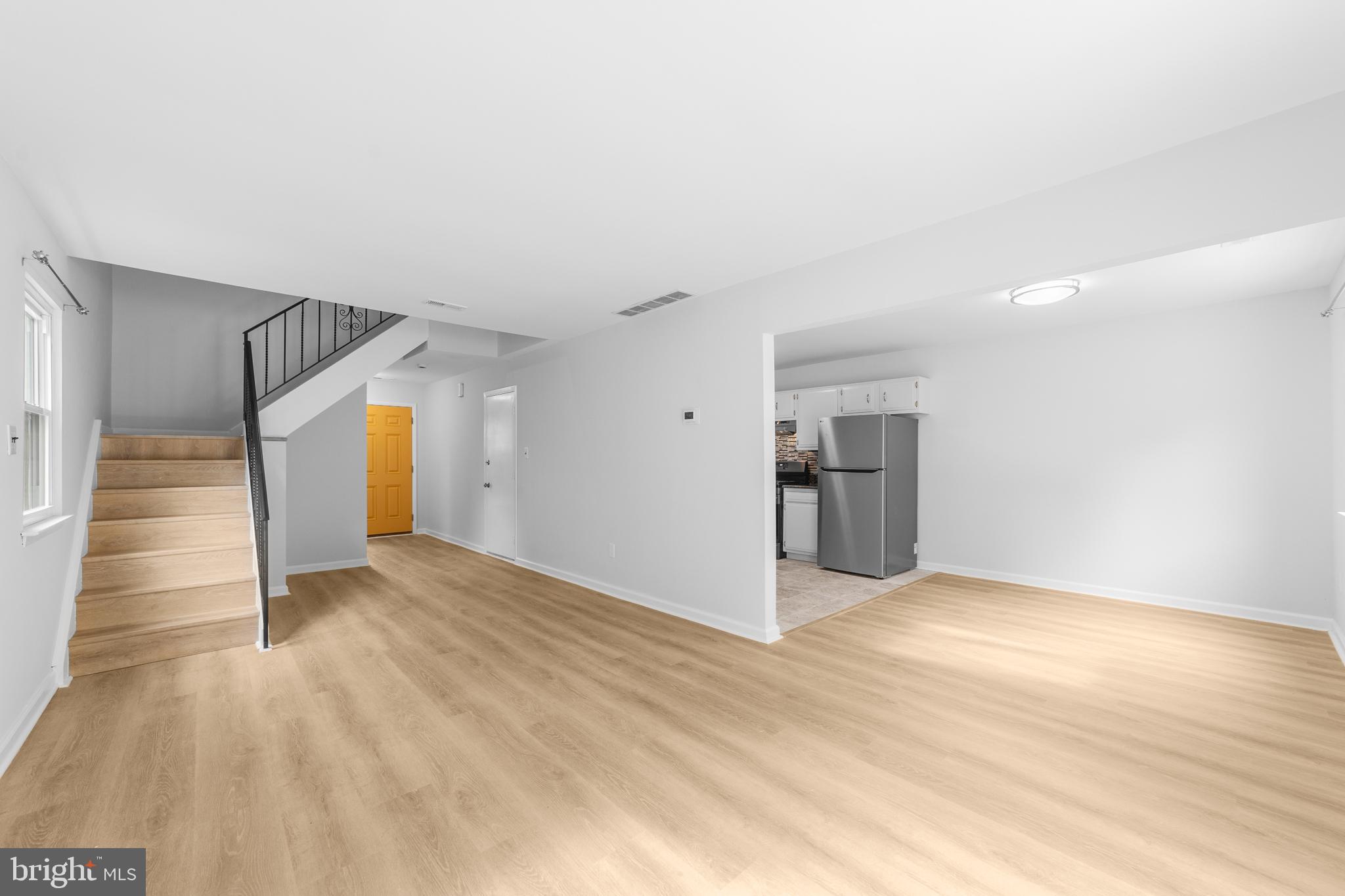 31 Phoenix Court Sewell, NJ 08080 - Photo 3 of 24 a view of a big room with wooden floor and windows