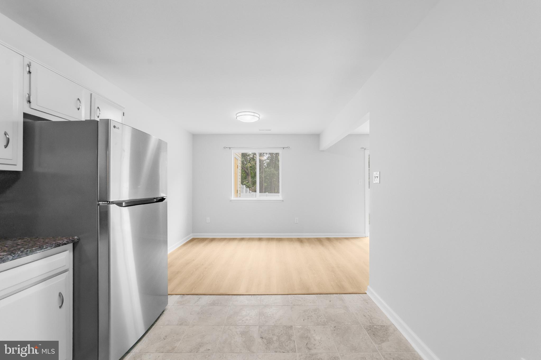 31 Phoenix Court Sewell, NJ 08080 - Photo 7 of 24 a view of an empty room with a fireplace