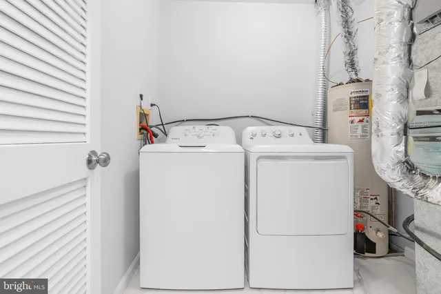 a bathroom with a sink a mirror and a vanity