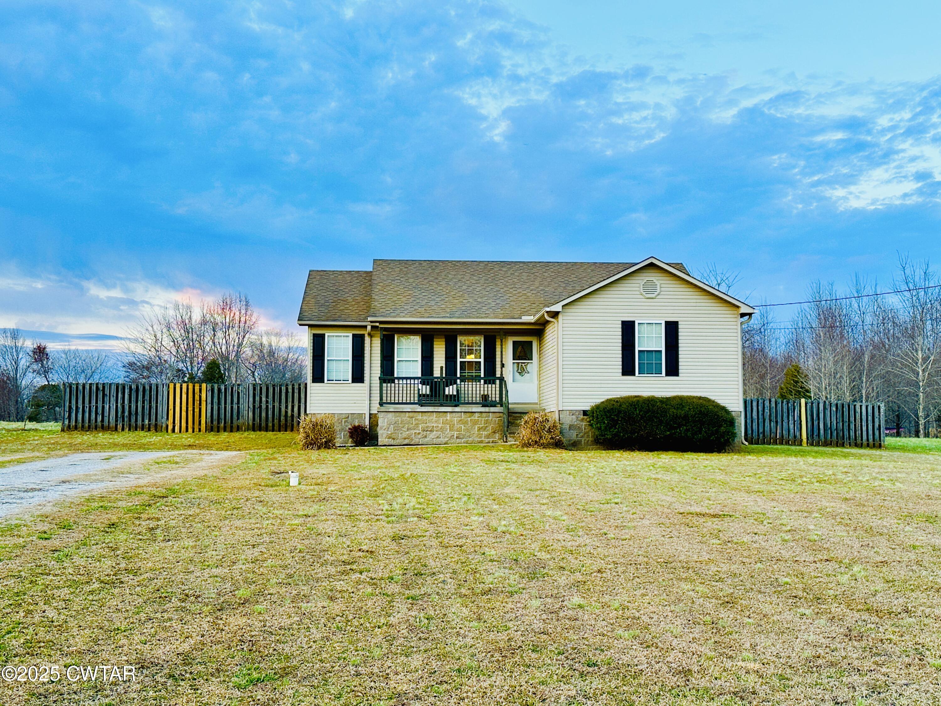 a view of a house with a swimming pool