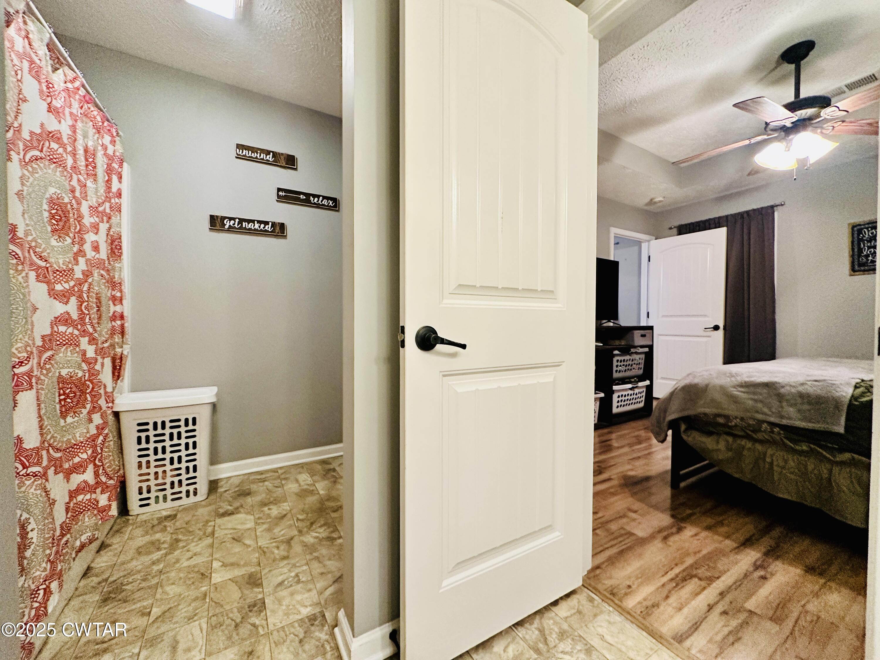 75 Bray Lane Beech Bluff, TN 38313 - Photo 17 of 25 a bedroom with a bed and a cabinets