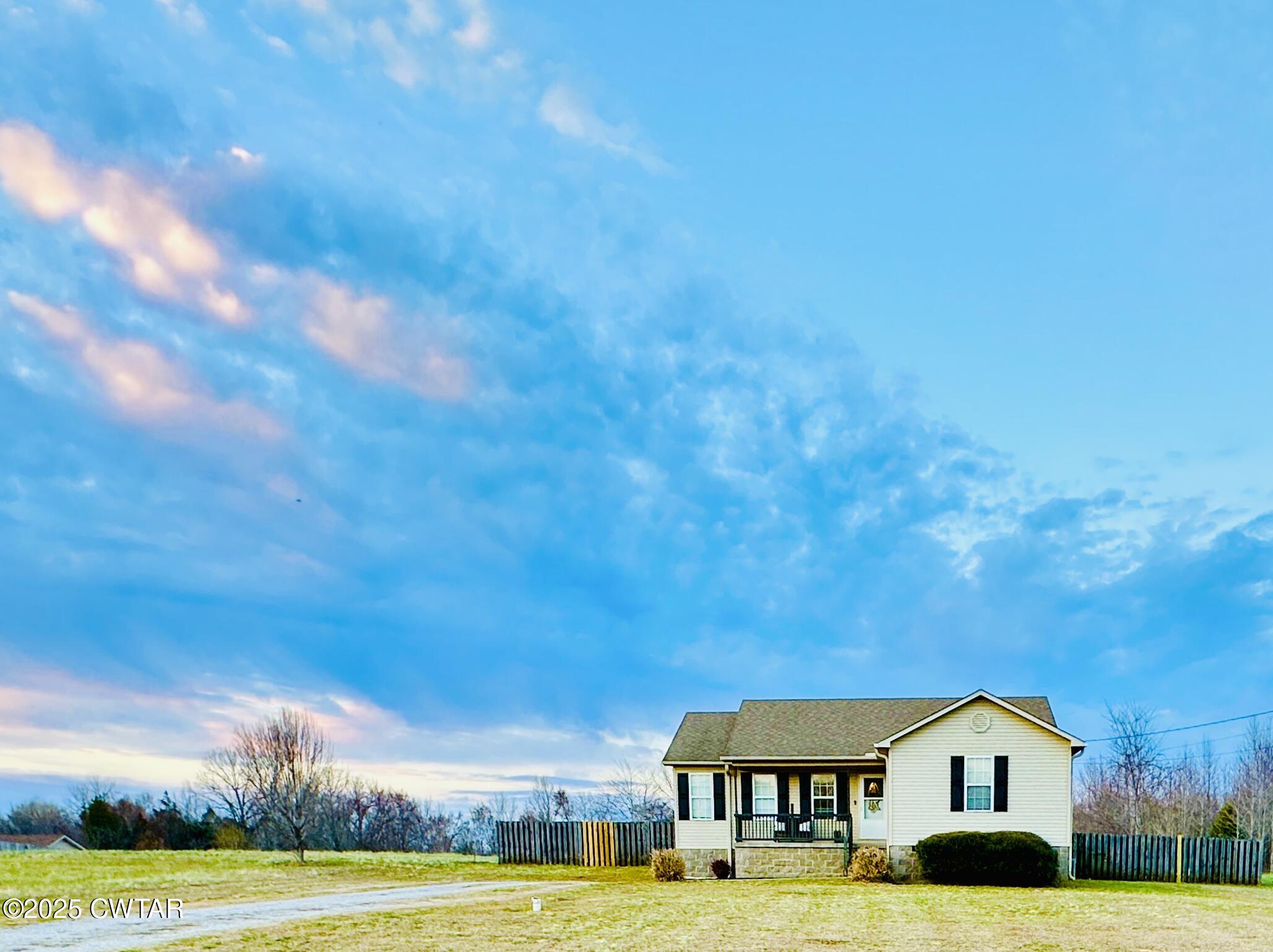 75 Bray Lane Beech Bluff, TN 38313 - Photo 2 of 25 a front view of a house with a yard