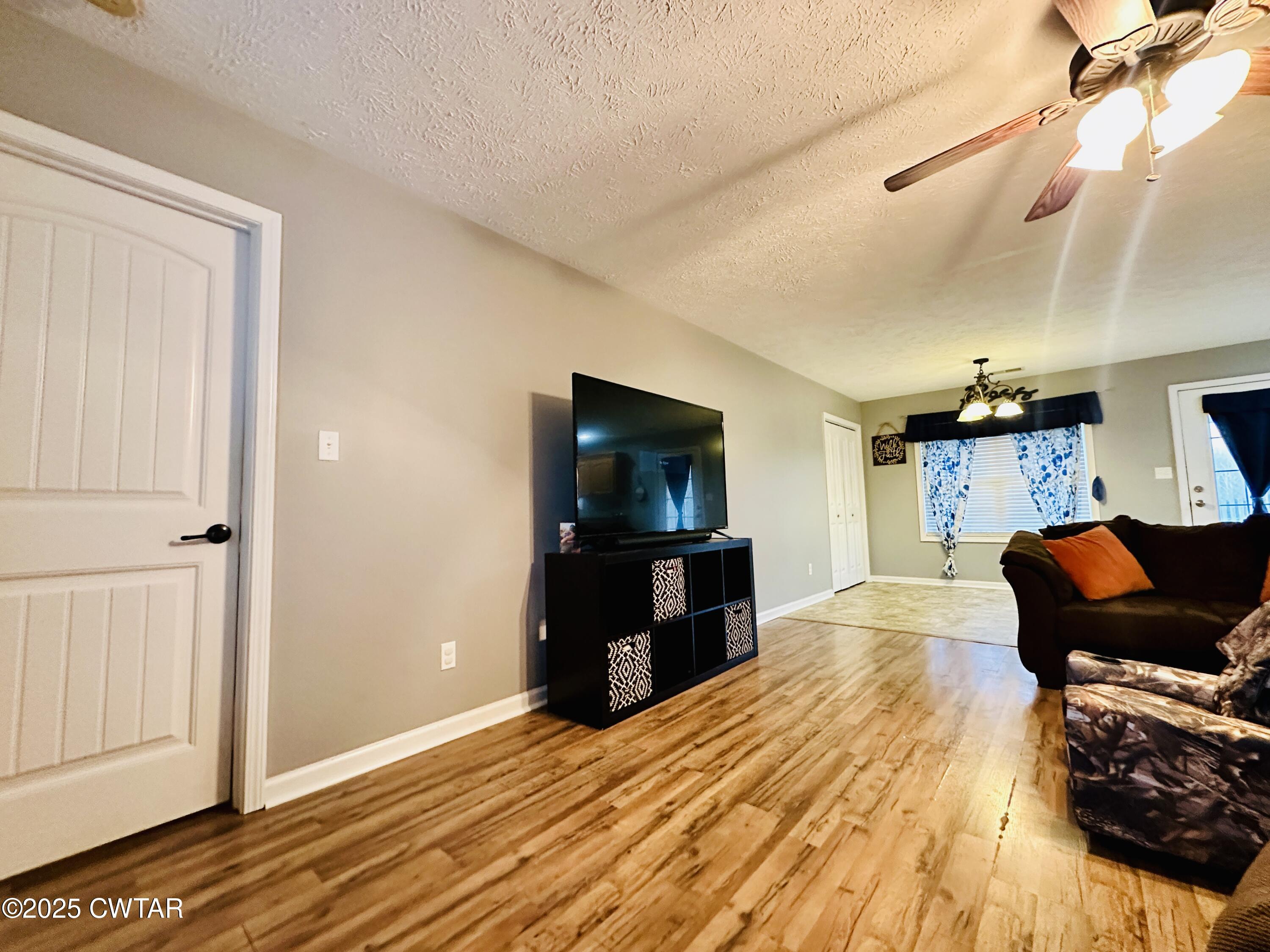 75 Bray Lane Beech Bluff, TN 38313 - Photo 7 of 25 a bedroom with furniture and a flat screen tv