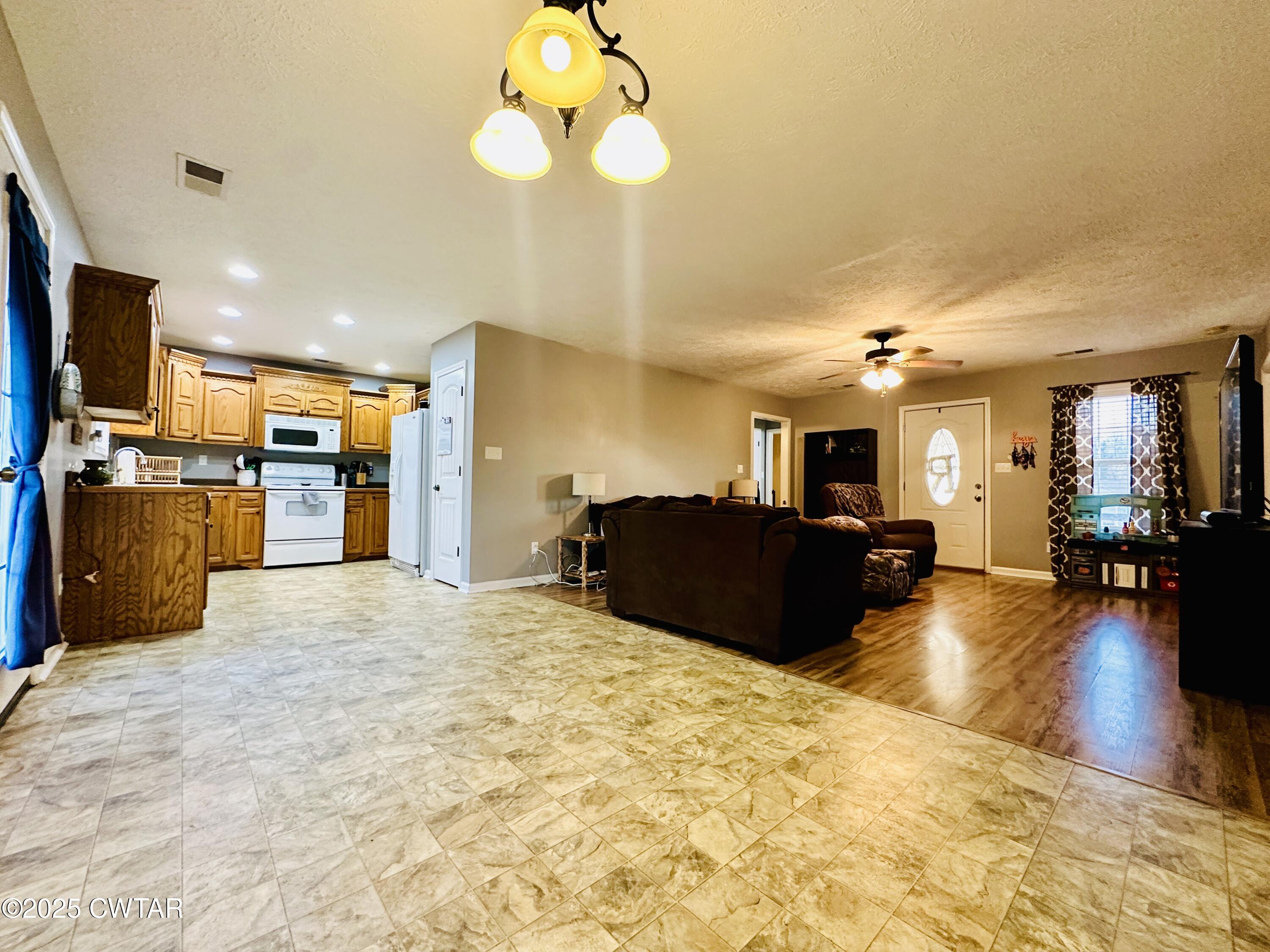 75 Bray Lane Beech Bluff, TN 38313 - Photo 9 of 25 a large room with furniture and kitchen view