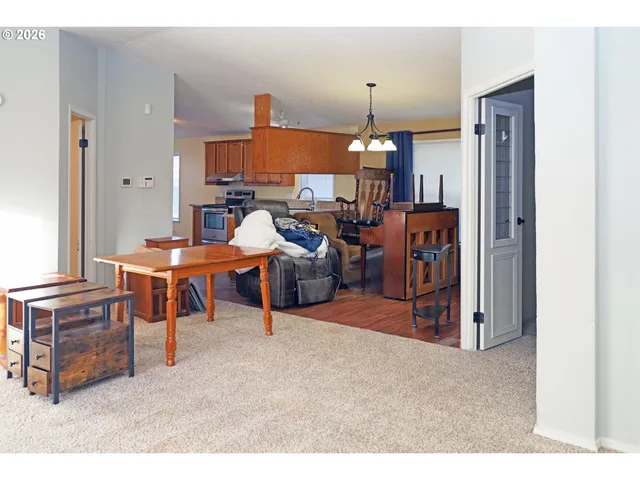 a room with furniture and a chandelier