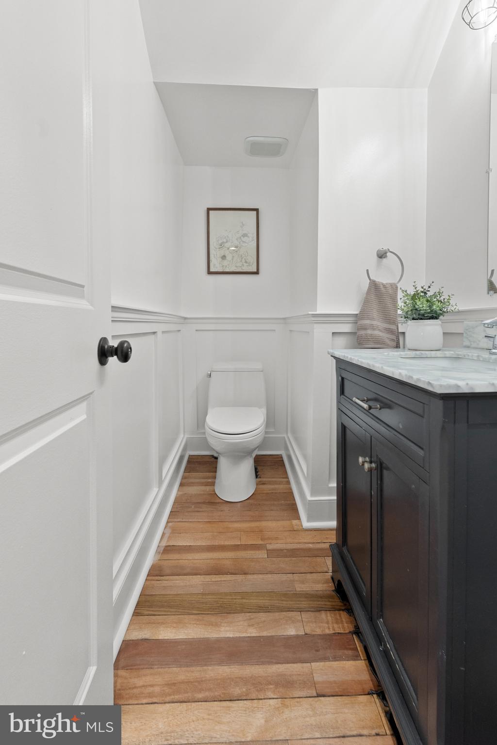 4604 Moravia Road Baltimore, MD 21206 - Photo 14 of 50 a bathroom with a sink and a mirror