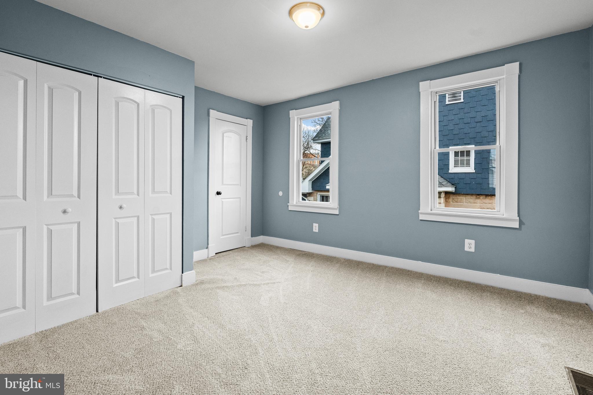 4604 Moravia Road Baltimore, MD 21206 - Photo 19 of 50 a view of an empty room with window and closet area