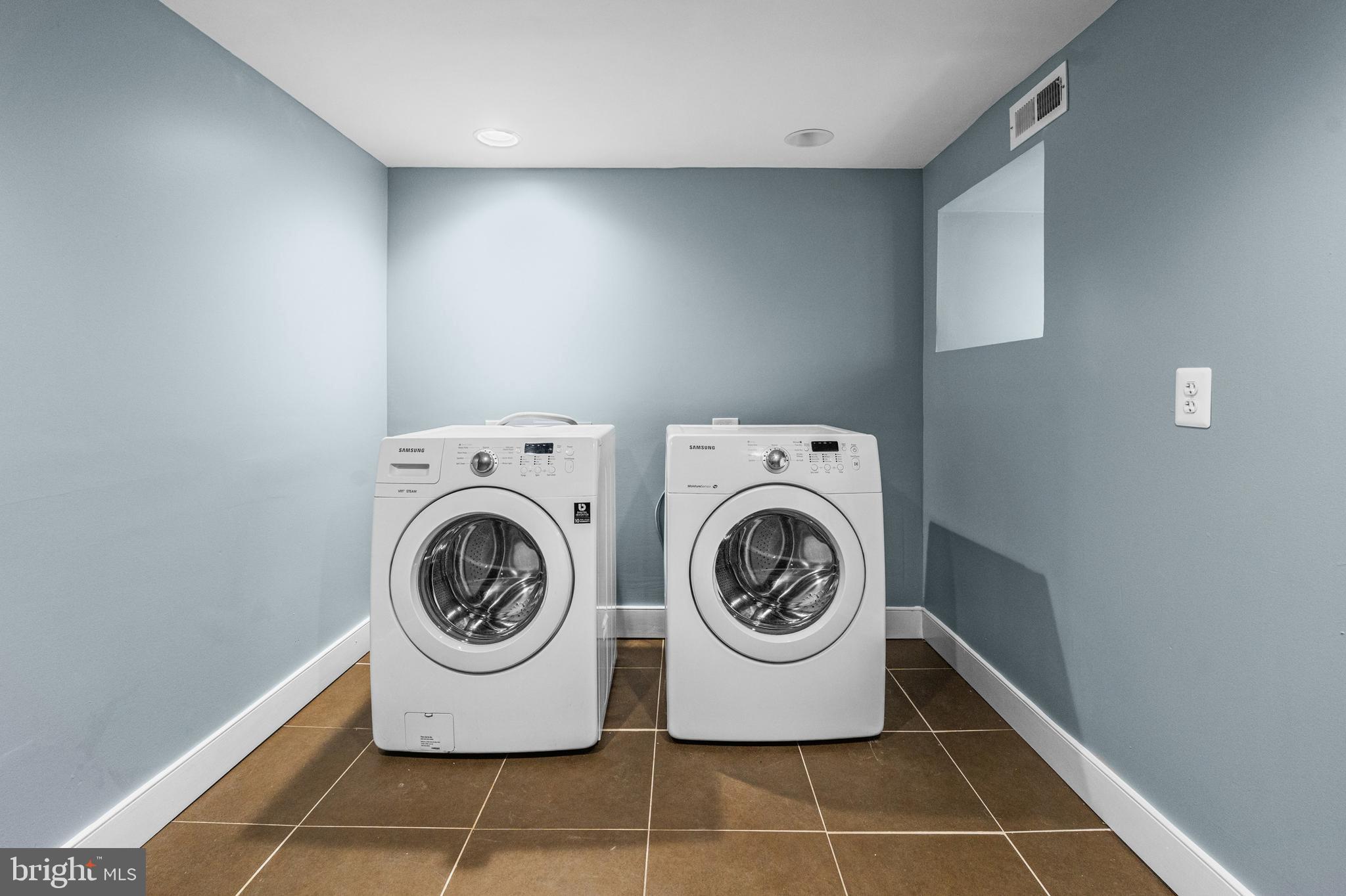 4604 Moravia Road Baltimore, MD 21206 - Photo 35 of 50 a utility room with dryer and washer