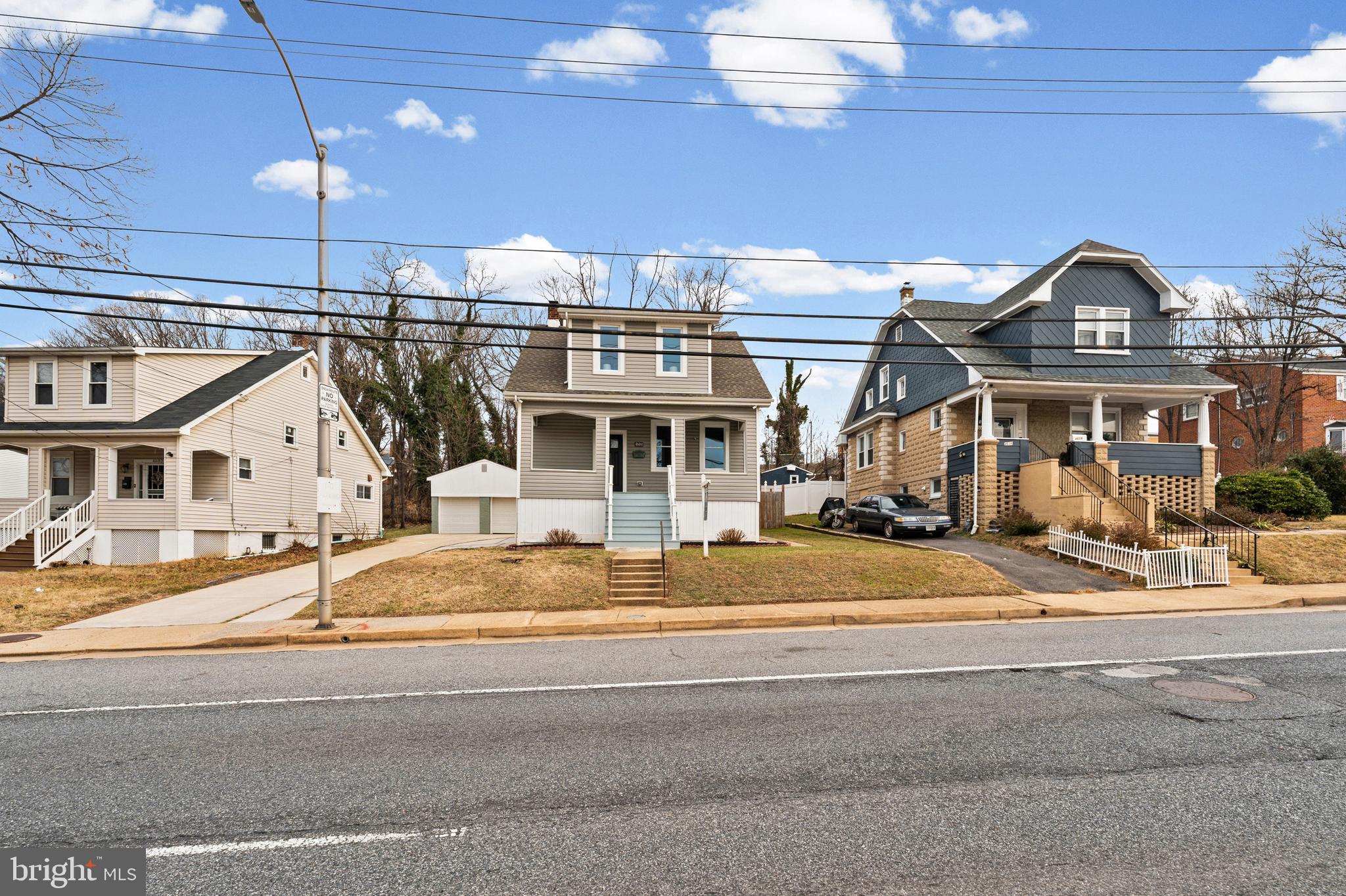 4604 Moravia Road Baltimore, MD 21206 - Photo 39 of 50 a front view of residential houses and street