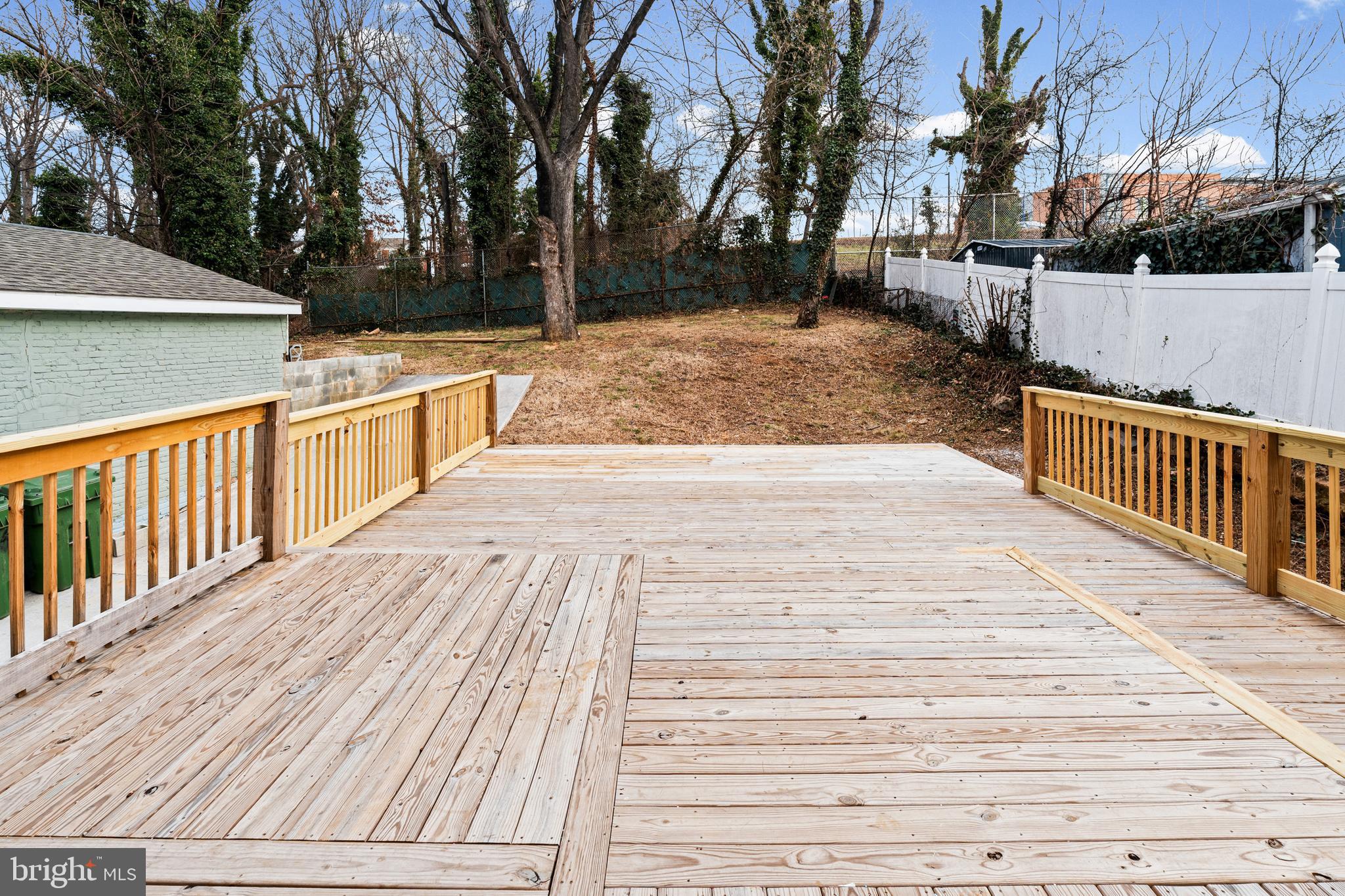 4604 Moravia Road Baltimore, MD 21206 - Photo 41 of 50 a view of a backyard with wooden floor