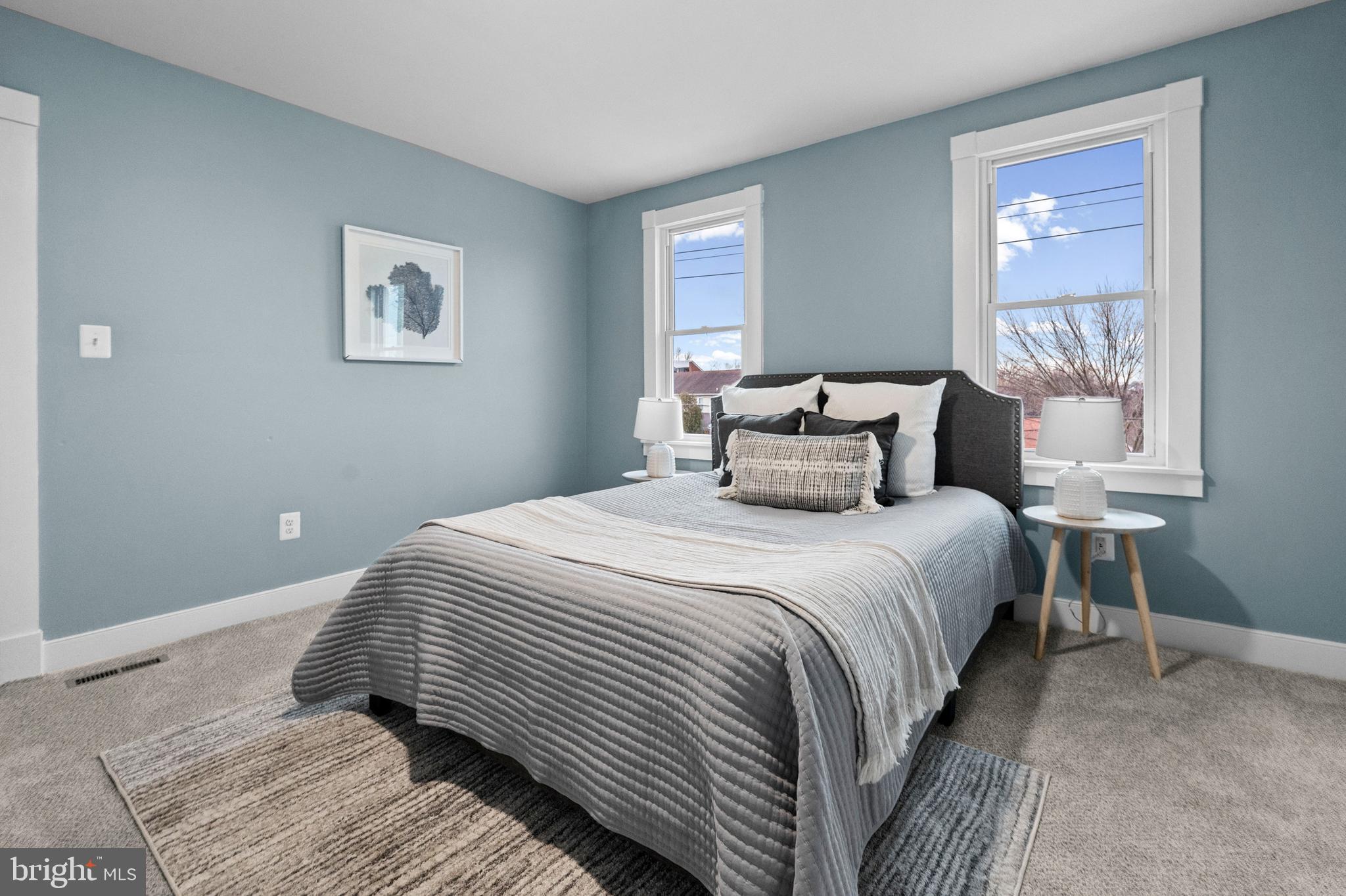 4604 Moravia Road Baltimore, MD 21206 - Photo 7 of 50 a bedroom with a bed and a window